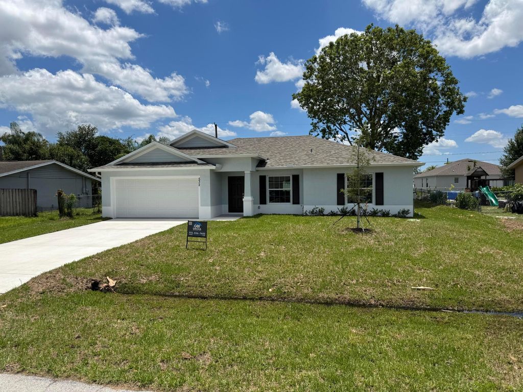 Photo of 532 SW Buswell Avenue, Port Saint Lucie, FL 34983 (MLS # B26028225)