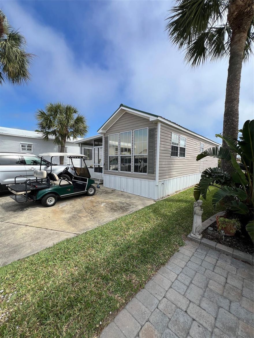 ~Ancient Oaks~ 55+ gated Community. 1 B 1B 2006 Chariot. Metal Roof New AC 2022. New flooring throughout. Huge screened in patio, very private backyard! Furnished, Double street- lots of parking for your boat! All measurements are approximate.