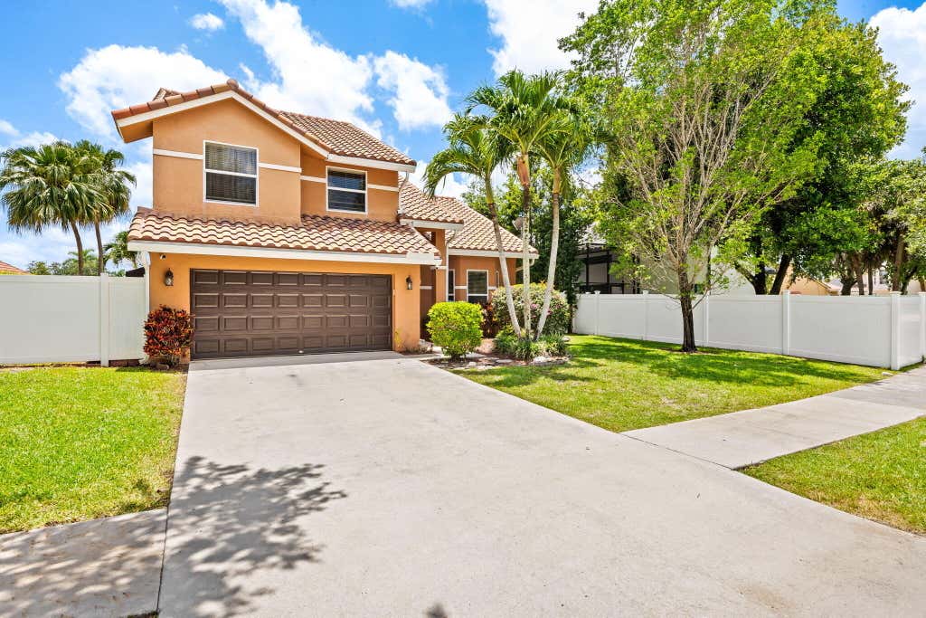 Photo of 6421 NW 57th Way, Parkland, FL 33067 (MLS # B26039534)
