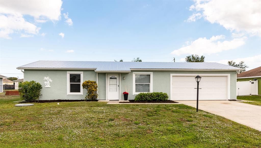 Photo of 621 SW Fredrica Street, Port Saint Lucie, FL 34983 (MLS # R10762586)