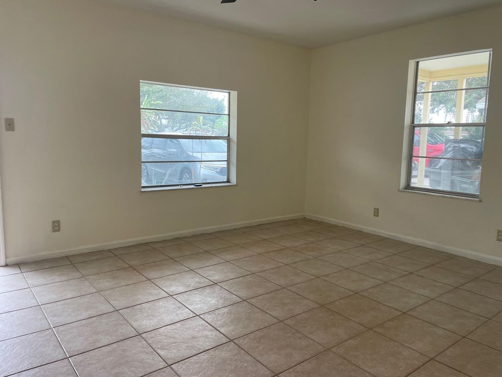 Photo of 339 Foresteria Drive, Lake Park, FL 33403 (MLS # R10943813)