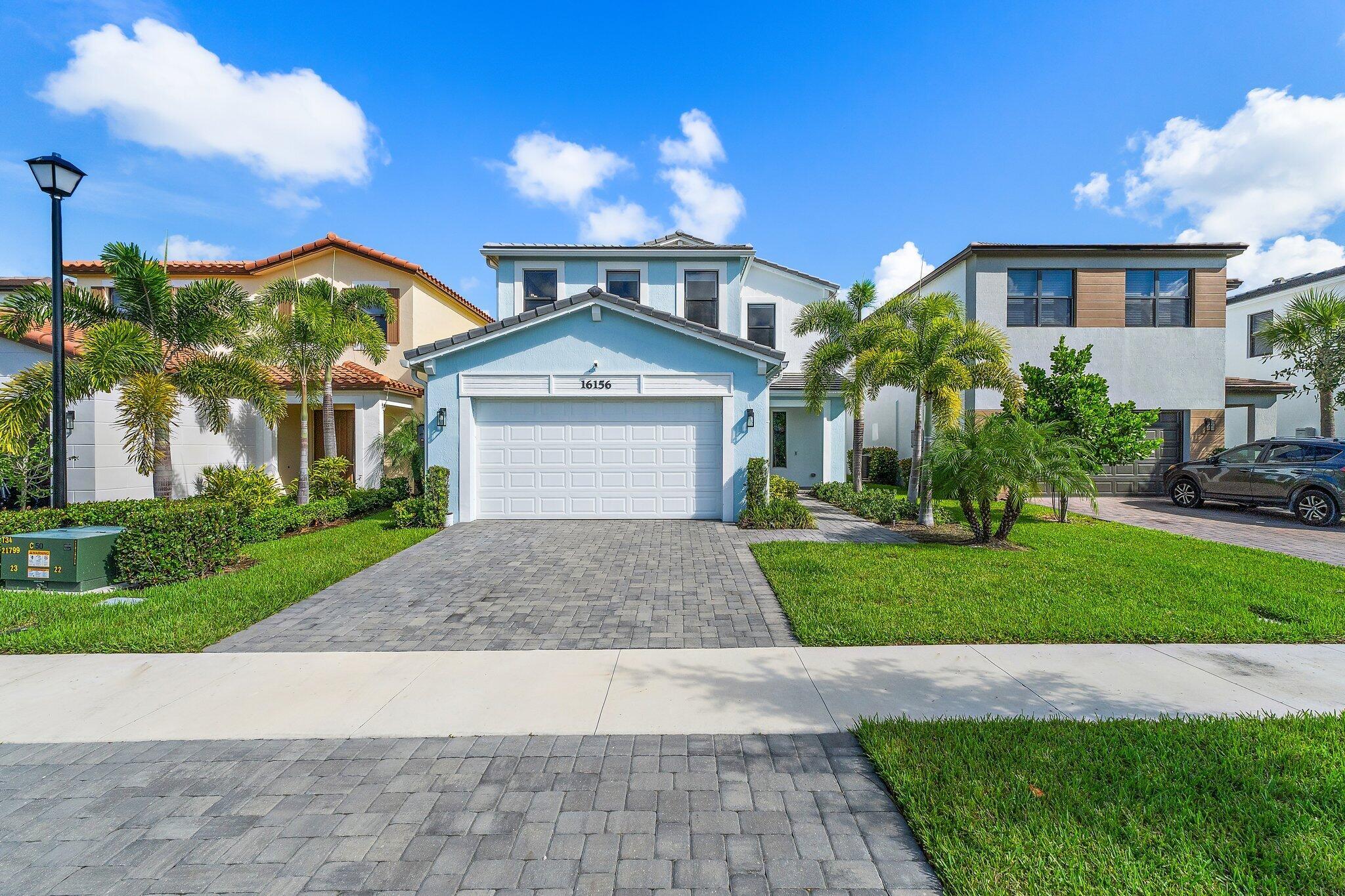 Newly constructed in 2023- this 4 bedroom, 3.5 bath, 2 car garage CBS home is designed for both style and comfort. Inside, the open-concept design features tile flooring throughout, a gourmet kitchen with upgraded cabinetry, farmhouse sink, quartz countertops, and a gas range. A private guest suite with full bath is conveniently located on the first floor, while the upstairs hosts the primary suite, two additional bedrooms, 2 full baths, oversized loft, custom bedroom closet built-ins, and laundry room with mud sink. Step outside to your own private oasis featuring a brand-new oversized saltwater pool with  heated infinity spa, and splash pad, all overlooking serene lake views. The fully fenced yard and spacious covered patio create the perfect space for outdoor entertaining.