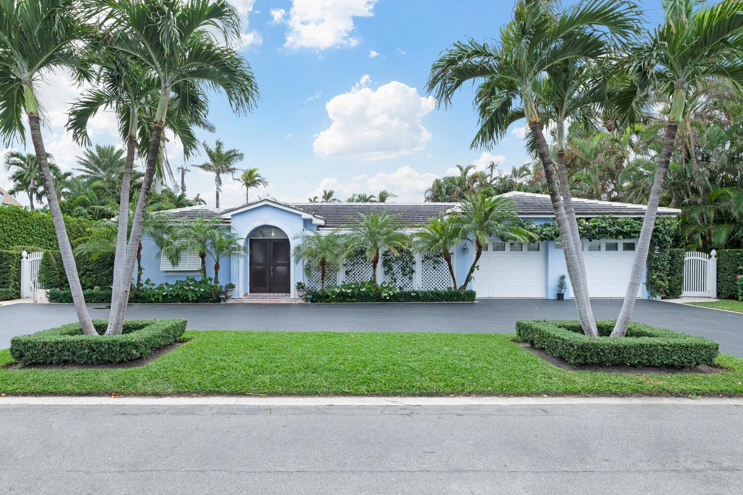 Experience classic Palm Beach living in this beautifully furnished three bedroom, three bath home located on one of the North End's most desirable streets. Nestled among lush tropical landscaping, this residence features a serene private garden, a sparkling pool, and a spacious enclosed patio perfect for relaxing or entertaining. The home offers a seamless blend of indoor-outdoor living, with elegant interiors and coastal charm throughout. Available for one-month rental with flexible dates - month of January or February 2026. Easy to show--schedule your tour today!