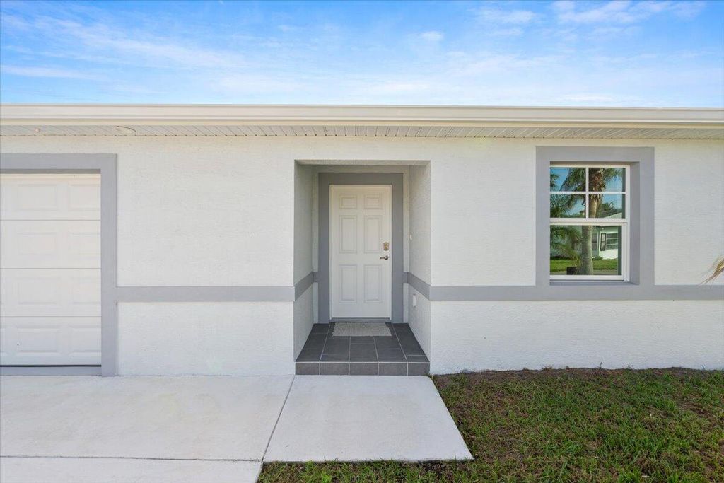 Photo of 62 Golf Drive, Port Saint Lucie, FL 34952 (MLS # R11035956)