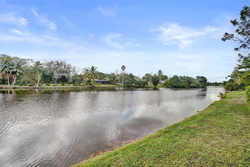 Photo of 9814 NW 1st Manor, Coral Springs, FL 33071 (MLS # F10551541)