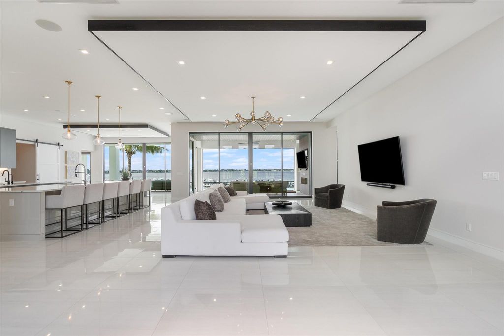 Photo of 1291 NE Langford Lane, Jensen Beach, FL 34957 (MLS # R10915076)