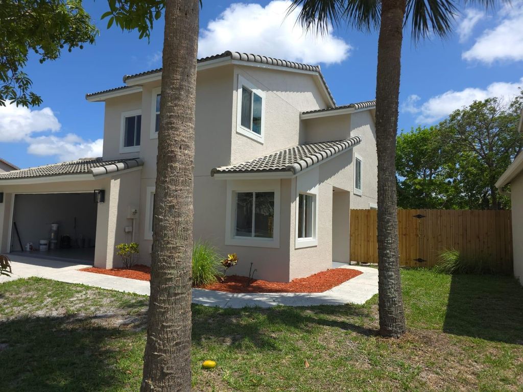 Photo of 6076 Strawberry Fields Way, Lake Worth, FL 33463 (MLS # F10506541)