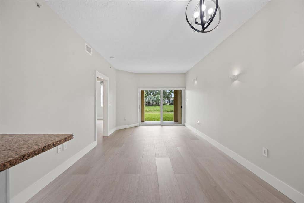Photo of 2020 Greenview Shores Boulevard #102, Wellington, FL 33414 (MLS # B26063509)