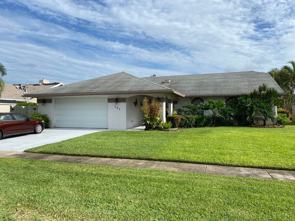 Photo of 191 Parkwood Drive, Royal Palm Beach, FL 33411 (MLS # R10968449)