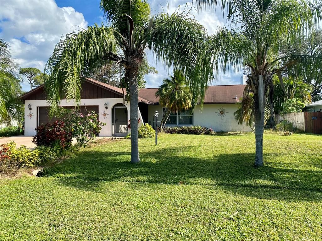 Photo of 731 SE Forgal Street, Port St Lucie, FL 34983 (MLS # R10857234)