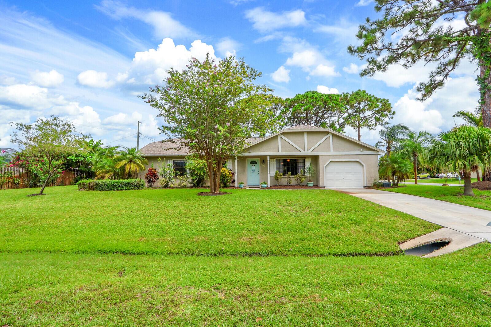 Come see this beautiful fully furnished home located in the in the heart of PSL close to shopping and the Beaches. Large corner lot tropically landscaped & 6 foot privacy fenced back yard. This home with 3 bedrooms, 2 bath, 1 car garage and a large screened patio with an oversized pool & spa. Monthly pool and lawn maintenance are included in rent! All you need to bring is your toothbrush!