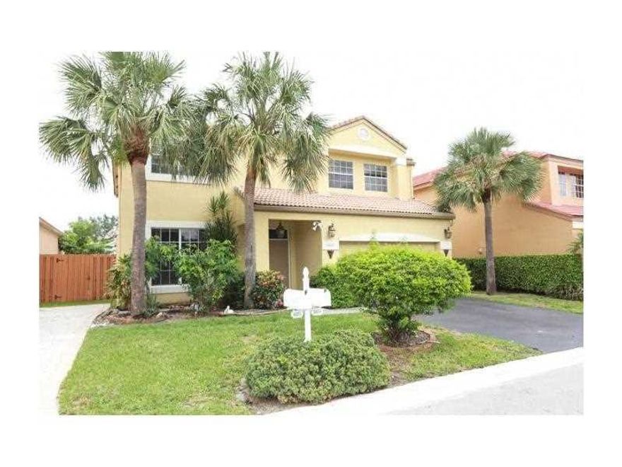 Offering 5 beds and 3 full baths, this gorgeous home provides plenty of space for your family. Hardwood floors up the stairs and on the second floor.  A spacious kitchen with an island, Covered Patio, fenced in yard. Located in a quiet neighborhood. A rated schools. New paint inside the entire home.  Outside will be painted soon. New roof will be on by Nov 1st.