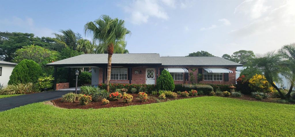 Photo of 219 W Norfolk Road, Jupiter, FL 33469 (MLS # R10918799)