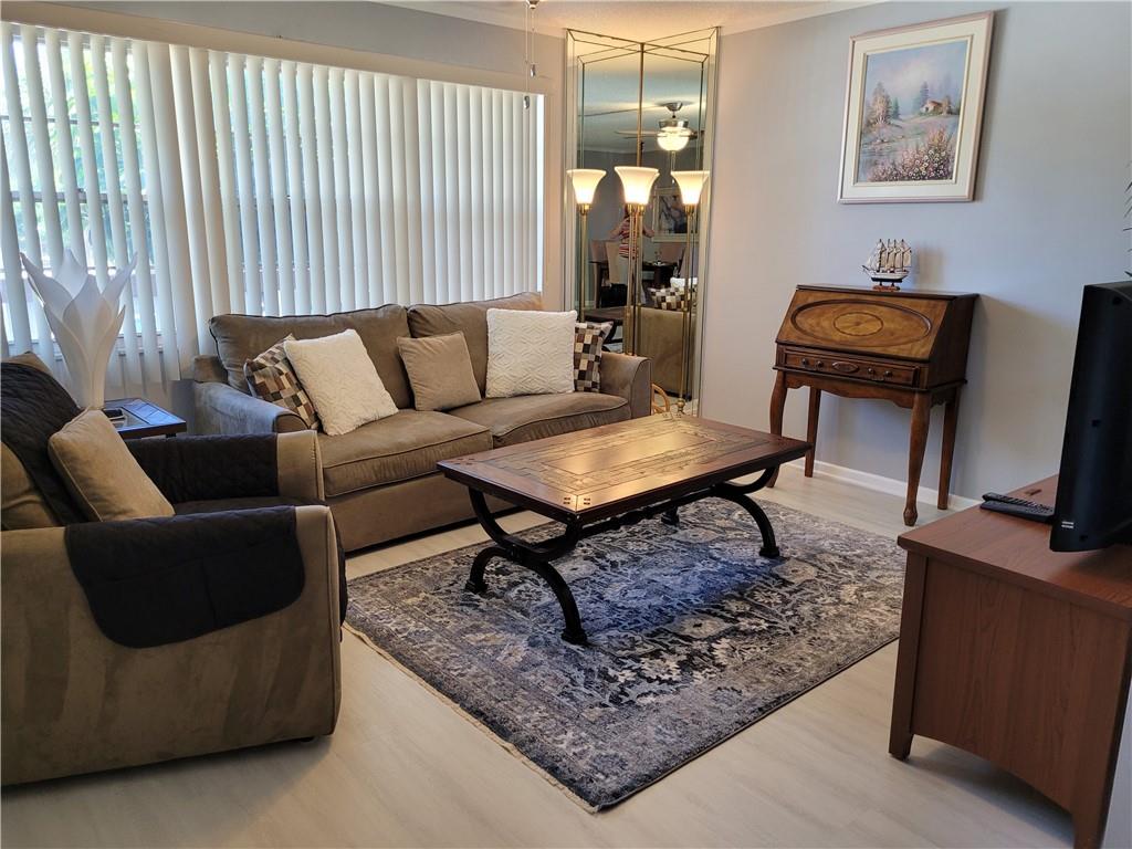 SEASONAL RENTAL. COZY 1/1.5 Fully Furnished Unit in Wynmoor! Located just a short walk from the main pool, fitness center, and community theatre, this unit offers convenience and is fully equipped! Includes all utilities! Enjoy live shows and movies, challenge friends to a game of pickleball, tennis, shuffleboard, or billiards, and unwind by the Olympic-size pool or in the soothing hot tub. Stay fit in the fully equipped fitness center or take a refreshing stroll through the one-of-a-kind walking current pool. With so many amenities to explore, this community offers something for everyone—come see it all for yourself! Minimum 4-month rental required! Includes all utilities!
