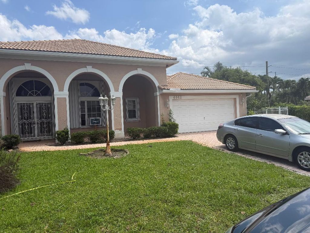 Photo of 4862 Cypress Drive S, Boynton Beach, FL 33436 (MLS # B26042968)