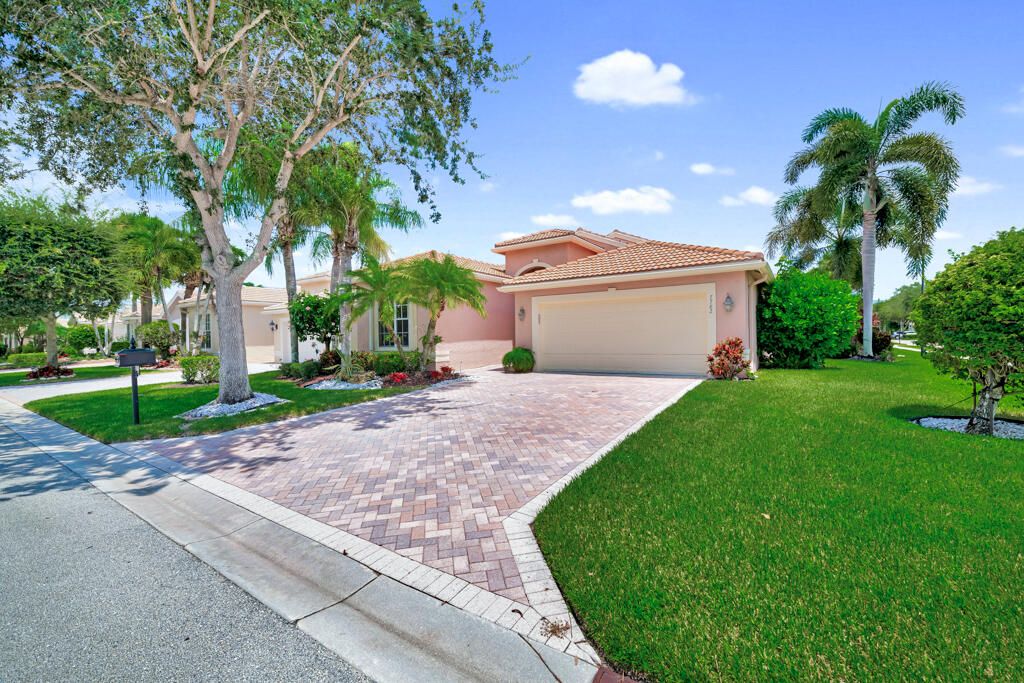Photo of 7782 Ocean Sunset Drive, Lake Worth, FL 33467 (MLS # R11013144)