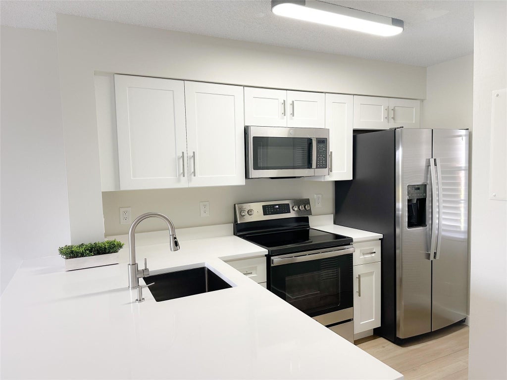 Photo of 2222 N Cypress Bend Drive #501, Pompano Beach, FL 33069 (MLS # F10444279)