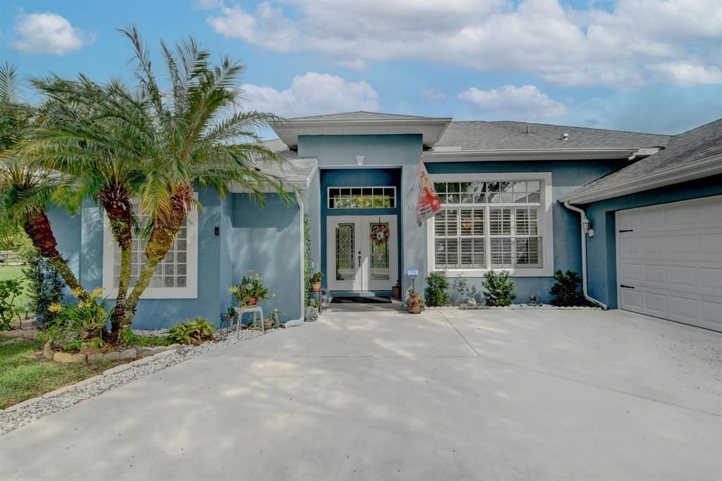 Photo of 326 SW Ridgecrest Drive Dr, Port St Lucie, FL 34953 (MLS # R10755280)