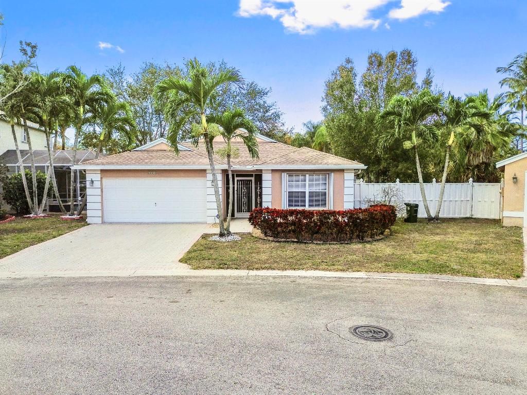Photo of 1718 Sawgrass Circle, Greenacres, FL 33413 (MLS # R11152599)