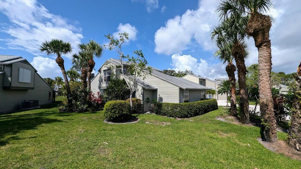 Photo of 906 NE Sandalwood Place, Jensen Beach, FL 34957 (MLS # R10984493)