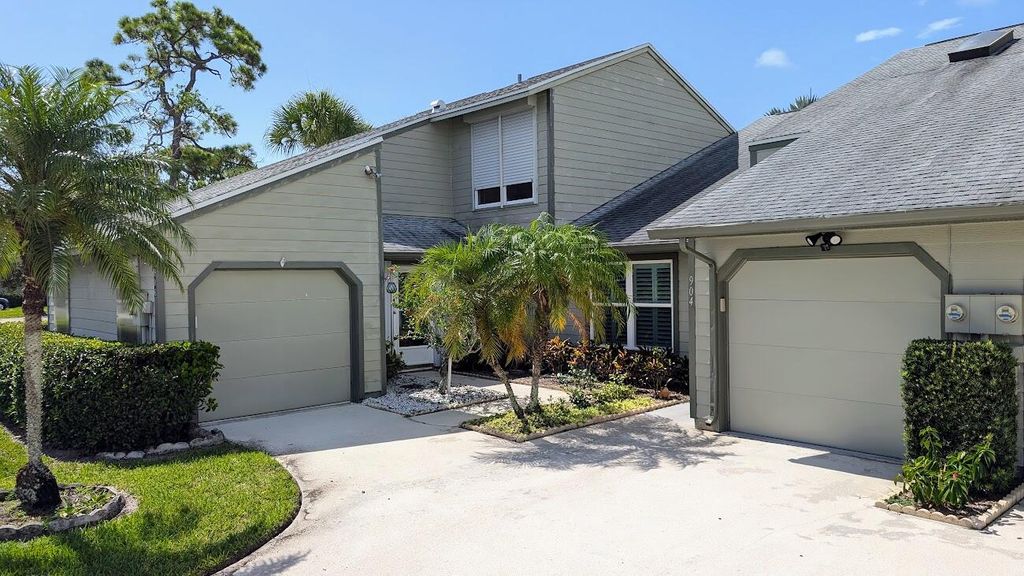 Photo of 906 NE Sandalwood Place, Jensen Beach, FL 34957 (MLS # R10984493)