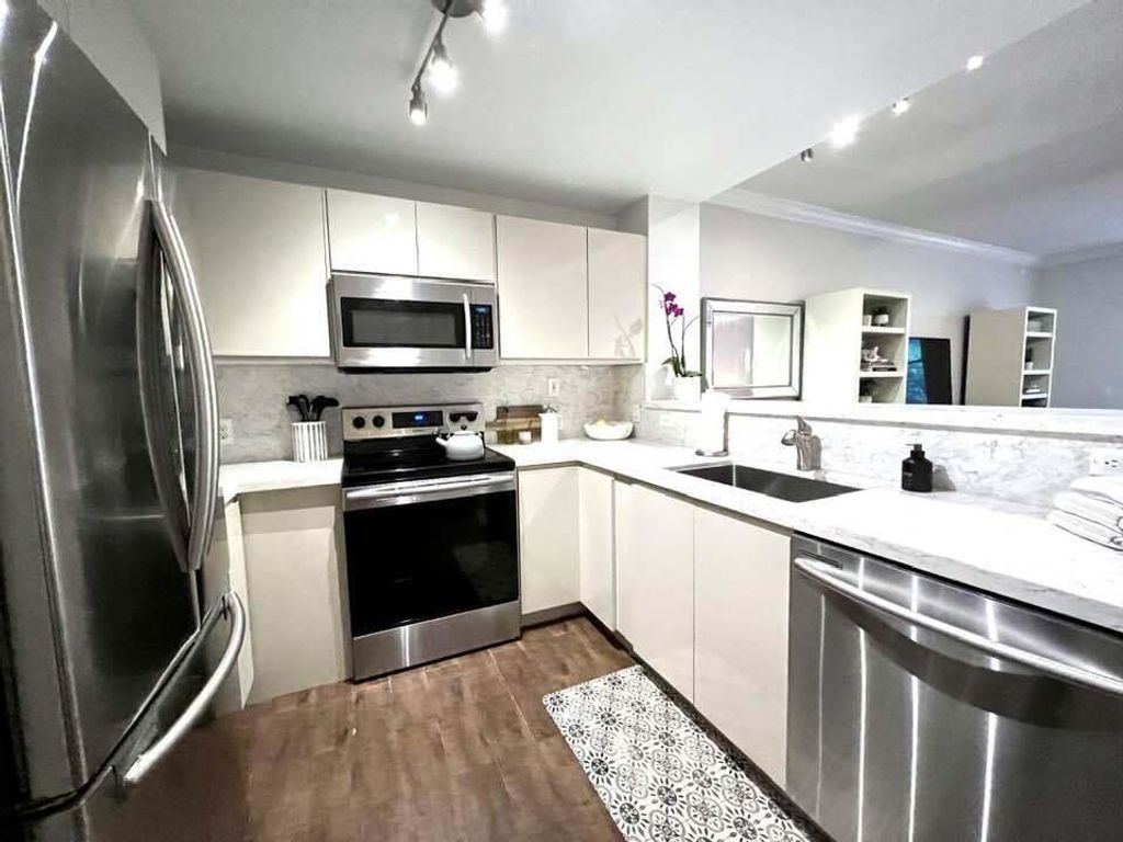 Photo of 11785 Saint Andrews Place #106, Wellington, FL 33414 (MLS # R10949917)