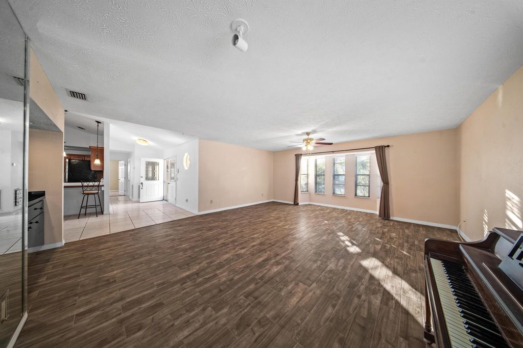 Photo of 510 SE Cliff Road, Port Saint Lucie, FL 34984 (MLS # R11071838)