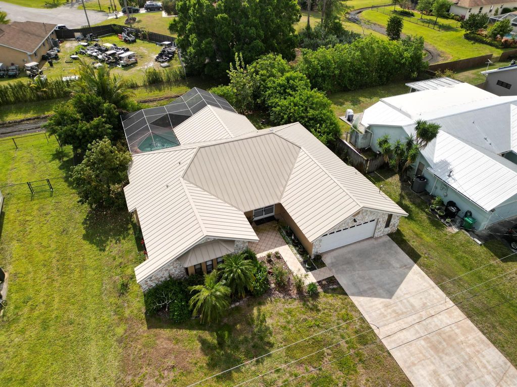 Photo of 510 SE Cliff Road, Port Saint Lucie, FL 34984 (MLS # R11071838)