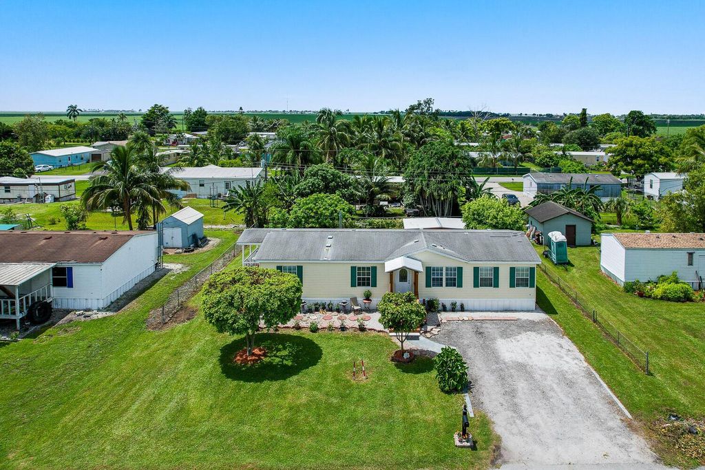 Photo of 1700 NE Ave K, Belle Glade, FL 33430 (MLS # R10907806)