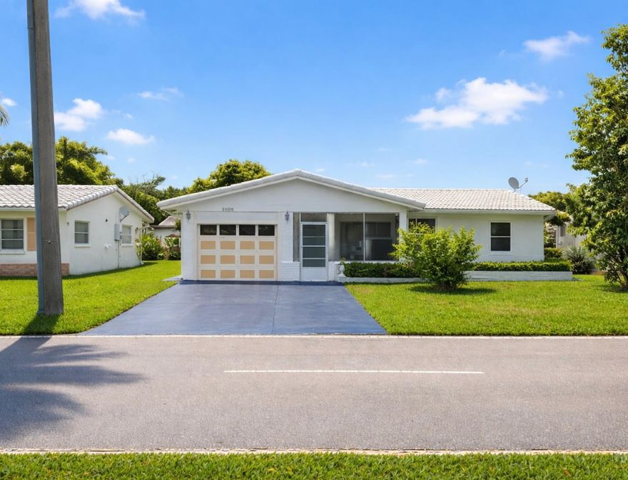 Charming 2/2 in Mainlands of Tamarac (55+) Spacious 2-bedroom, 2-bathroom home with a 1-car garage, featuring neutral tile flooring throughout and an abundance of natural light. The home offers a great layout with plenty of potential perfect for adding your personal touch. The property is currently occupied, so furnishings and personal belongings may be present during showings. Located on a quiet street, the home includes a private driveway plus additional street parking. Conveniently located near shopping, dining, medical facilities, and entertainment. Enjoy all the benefits of this vibrant 55+ community, including a clubhouse, pool, and low-maintenance living. Ideal for full-time residents or as a seasonal retreat!