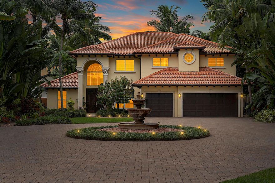 Mediterranean Luxury with Unobstructed Lake Views. Experience the perfect blend of elegance and comfort in this multi-level Mediterranean estate, which offers unobstructed panoramic lake views from every room. A custom elevator connects spacious levels, while outdoors, a heated infinity saltwater pool, summer kitchen, and large dock with boathouse create the ultimate lakefront lifestyle. Inside, enjoy a gourmet kitchen with stainless steel appliances, soaring vaulted ceilings, and a primary suite with a private balcony, his & her walk-in closets, and spa-inspired finishes. Surrounded by tropical landscaping, a circular drive, and backed by a whole-house generator, this home delivers luxury, convenience, and breathtaking waterfront living at its finest.