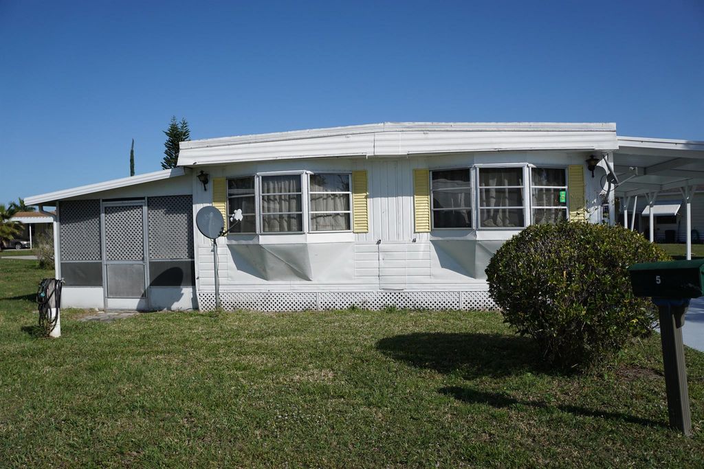 Photo of 5 Ventura Lane, Port Saint Lucie, FL 34952 (MLS # R10963287)