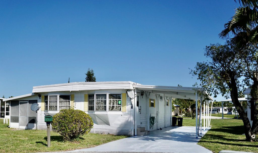 Photo of 5 Ventura Lane, Port Saint Lucie, FL 34952 (MLS # R10963287)