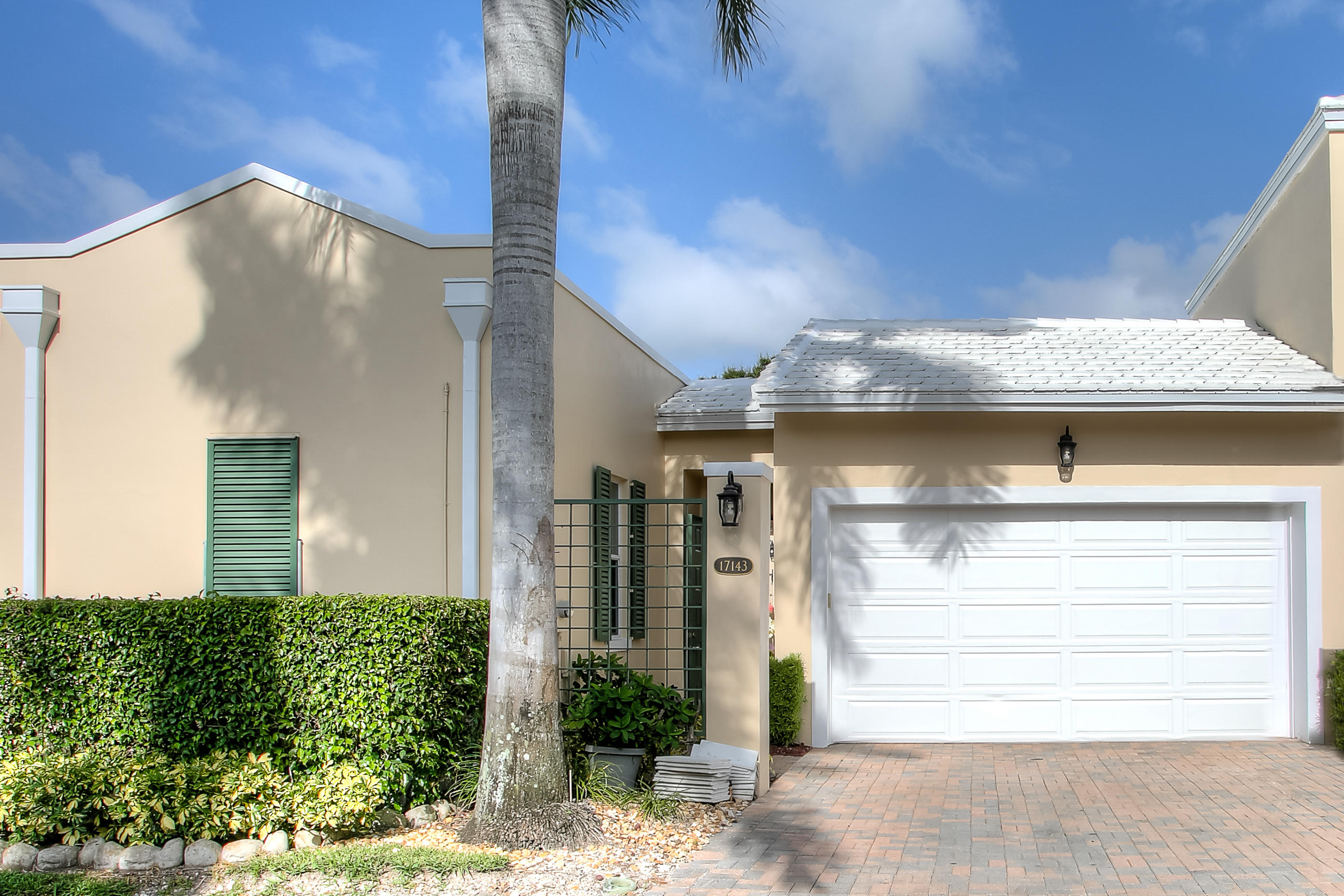Picture Perfect Courtyard Villa with garage and guest house is ready for that first time home buyer, empty nester or snow bird. This home features soaring ceilings all neutral decor. Oversized kitchen leads to outdoor patio and private yard. Spacious master suite overlooks private pool. The guest house is perfect for an office or guests wanting to have their own privatebungalow. The home features a brand new roof just installed this month to the latest building codes. Live the country club lifestyle without the country club price. Impeccably maintained common areas and 24/7 gated security with roving patrol. Best Boca Raton location close to the highways and public transportation. ''A'' rated school district. A must see and pleasure to show Bring you toothbrush everything is done!