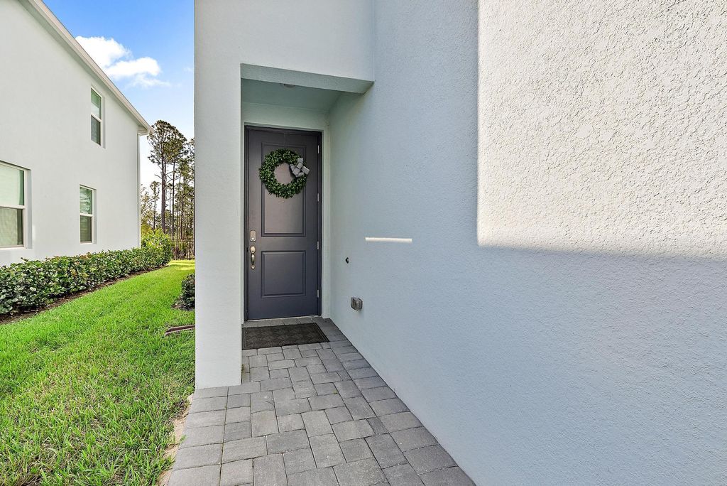 Photo of 246 Osprey Preserve Boulevard, Jensen Beach, FL 34957 (MLS # R11064658)