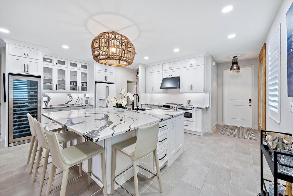 Photo of 246 Osprey Preserve Boulevard, Jensen Beach, FL 34957 (MLS # R11064658)