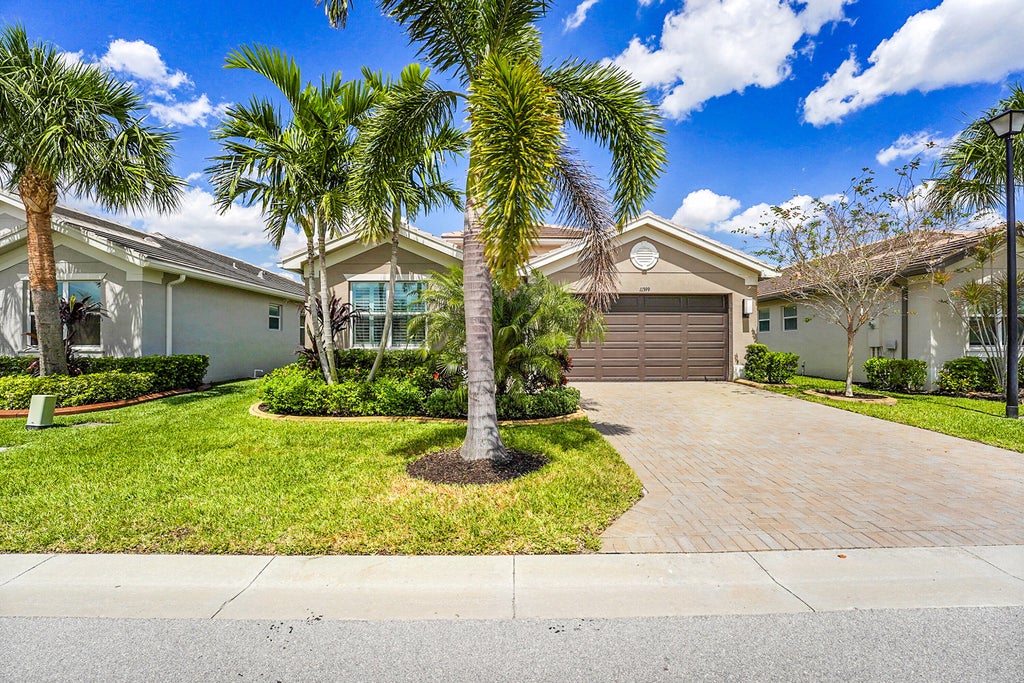 Photo of 11399 SW Hawkins Terrace, Port Saint Lucie, FL 34987 (MLS # R11075826)