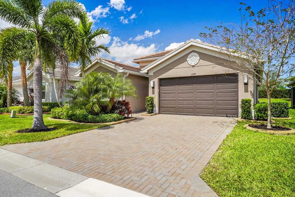 Photo of 11399 SW Hawkins Terrace, Port Saint Lucie, FL 34987 (MLS # R11075826)