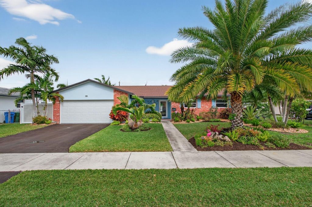 Photo of 1921 NW 43rd Street, Oakland Park, FL 33309 (MLS # F10545697)