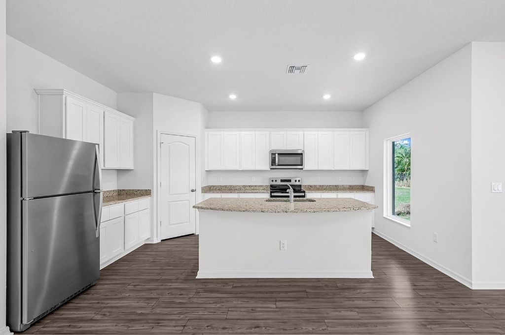 Photo of 2001 SW Algiers Street, Port Saint Lucie, FL 34953 (MLS # F10496389)