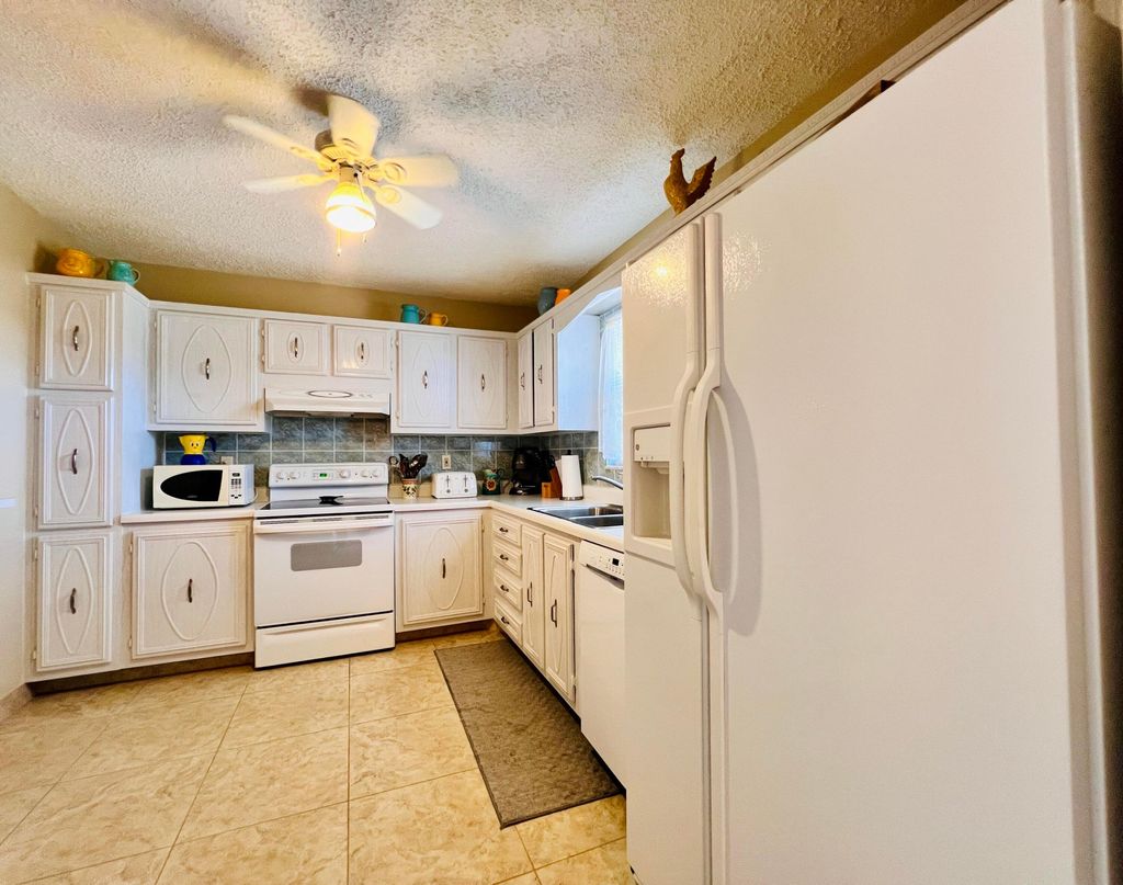 Photo of 203 Oxford 500, West Palm Beach, FL 33417 (MLS # R11166125)