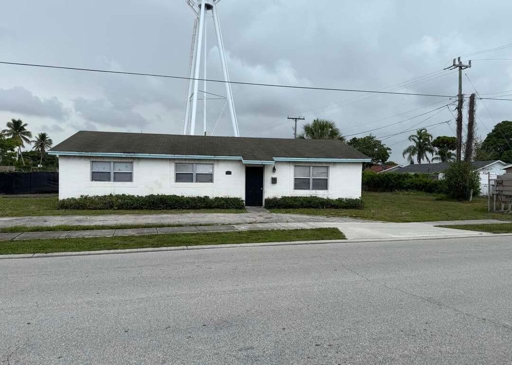 Photo of 5713 Candlewood Street, Mangonia Park, FL 33407 (MLS # B26006831)