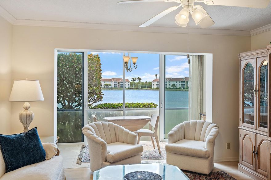 Experience effortless coastal luxury in this rare first-floor 2-bedroom, 2-bath lakefront residence in the exclusive Jensen Beach Club—just steps from the sand.  Perfectly positioned for both privacy and convenience, this highly sought-after first-floor unit offers serene water views and seamless indoor-outdoor living with no stairs or elevators—an exceptional find in an oceanfront community. Enjoy peaceful mornings overlooking the lake and spend your days just moments away from the beach.  Jensen Beach Club delivers a true resort-style lifestyle, featuring private beach access, a heated oceanfront pool, clubhouse, tennis courts, and beautifully maintained grounds. The association enhances the ease of ownership by covering roof maintenance, building insurance, cable TV, water,  pest control, and full access to all amenities—allowing you to simply enjoy and unwind.  Located on Hutchinson Island in Jensen Beach, you're minutes from vibrant downtown dining, boutique shopping, marinas, and golf, while still enjoying the tranquility of island living.  Rare. Convenient. Coastal. Opportunities like this—first-floor, lake view, and steps to the ocean—seldom come available. Whether as a full-time residence, luxury getaway, or investment, this is Florida living at its finest.