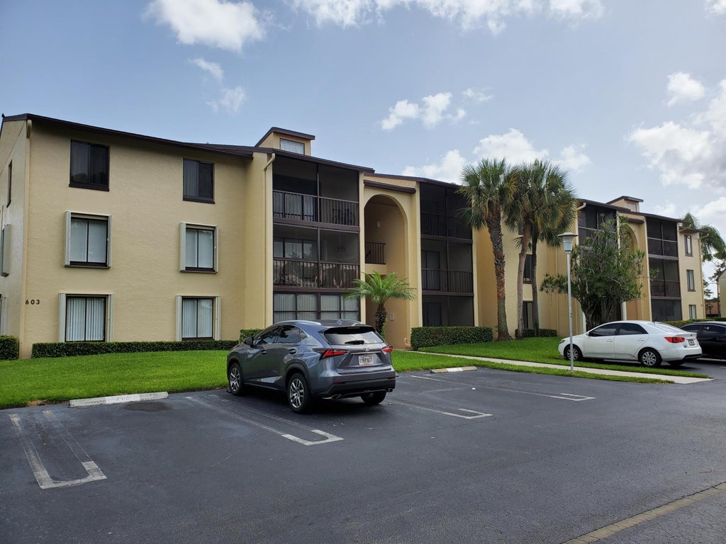 Photo of 603 Sea Pine Way, Greenacres, FL 33415 (MLS # B26042248)