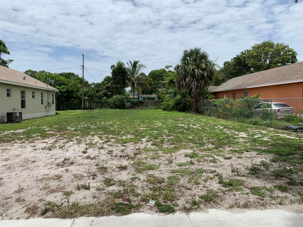 Vacant land located between two newer homes. No time requirement to build. Sidewalk street lined with beautiful trees.