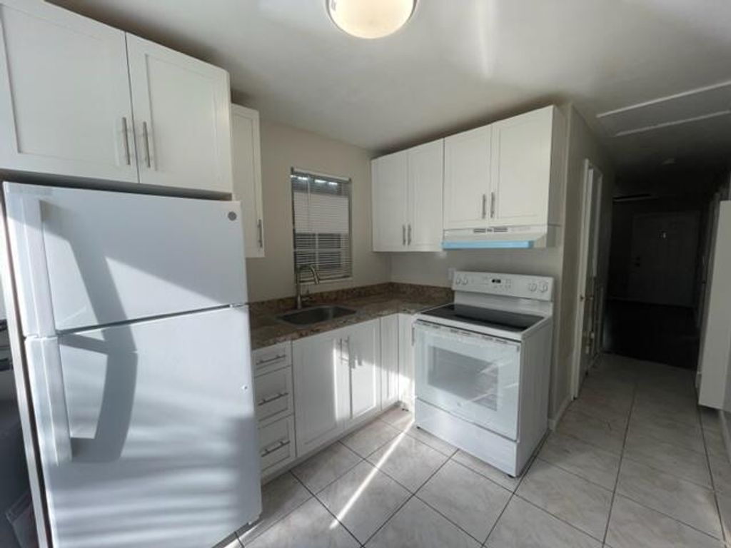 Photo of 420 DOUGLASS Avenue, West Palm Beach, FL 33401 (MLS # B26056968)