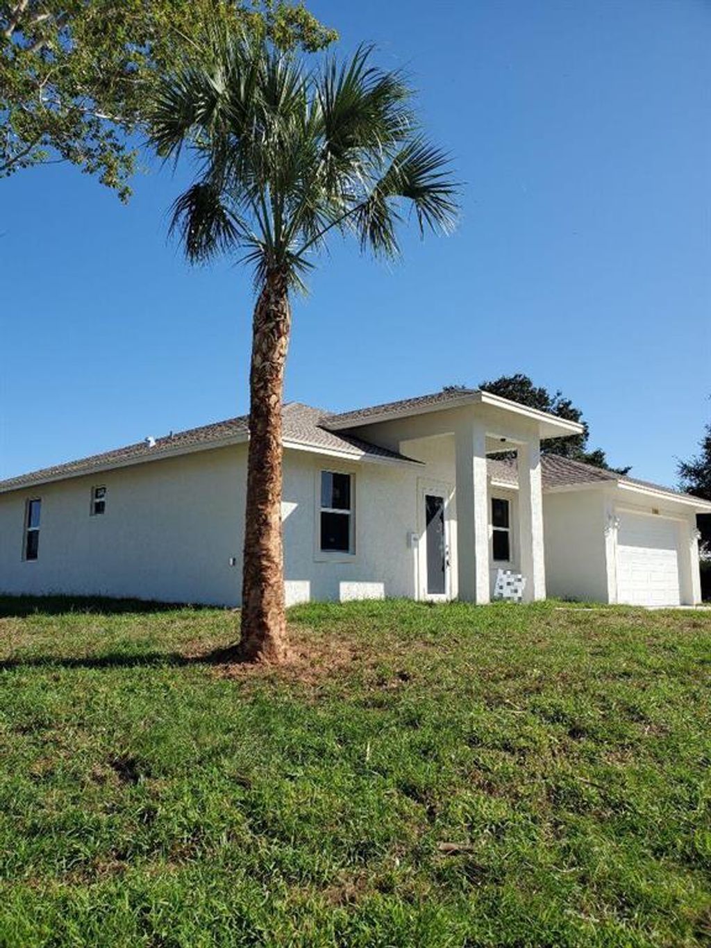 Photo of 2473 SE Calais Street, Port Saint Lucie, FL 34952 (MLS # R10762738)