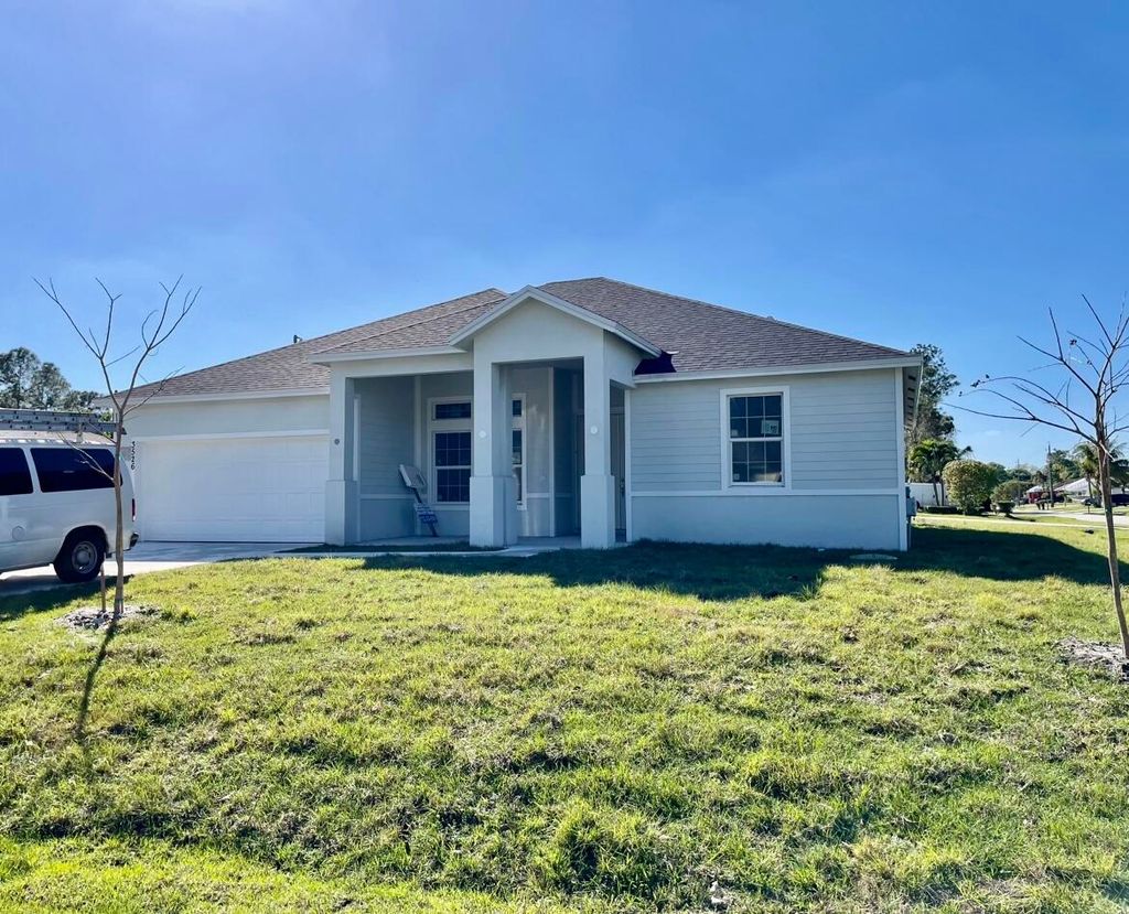 Photo of 3526 SW Europe Street, Port Saint Lucie, FL 34953 (MLS # R10902275)