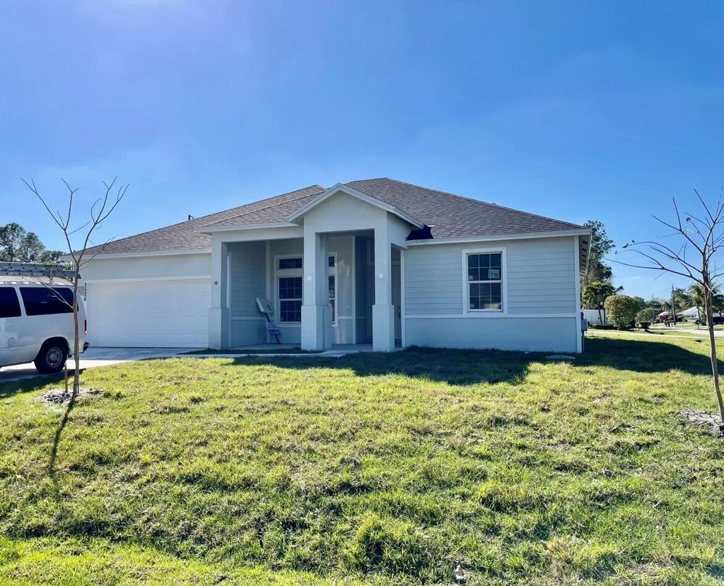 Photo of 3526 SW Europe Street, Port Saint Lucie, FL 34953 (MLS # R10902275)