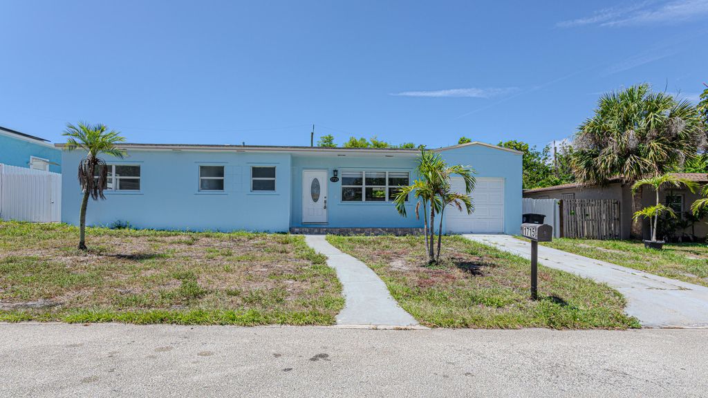 Photo of 1715 12th Avenue N, Lake Worth Beach, FL 33460 (MLS # R11100309)